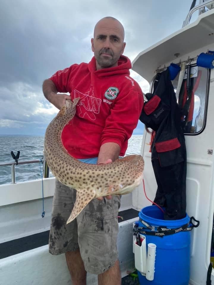 Ian Leatham and Jordan Graham with a couple of different species