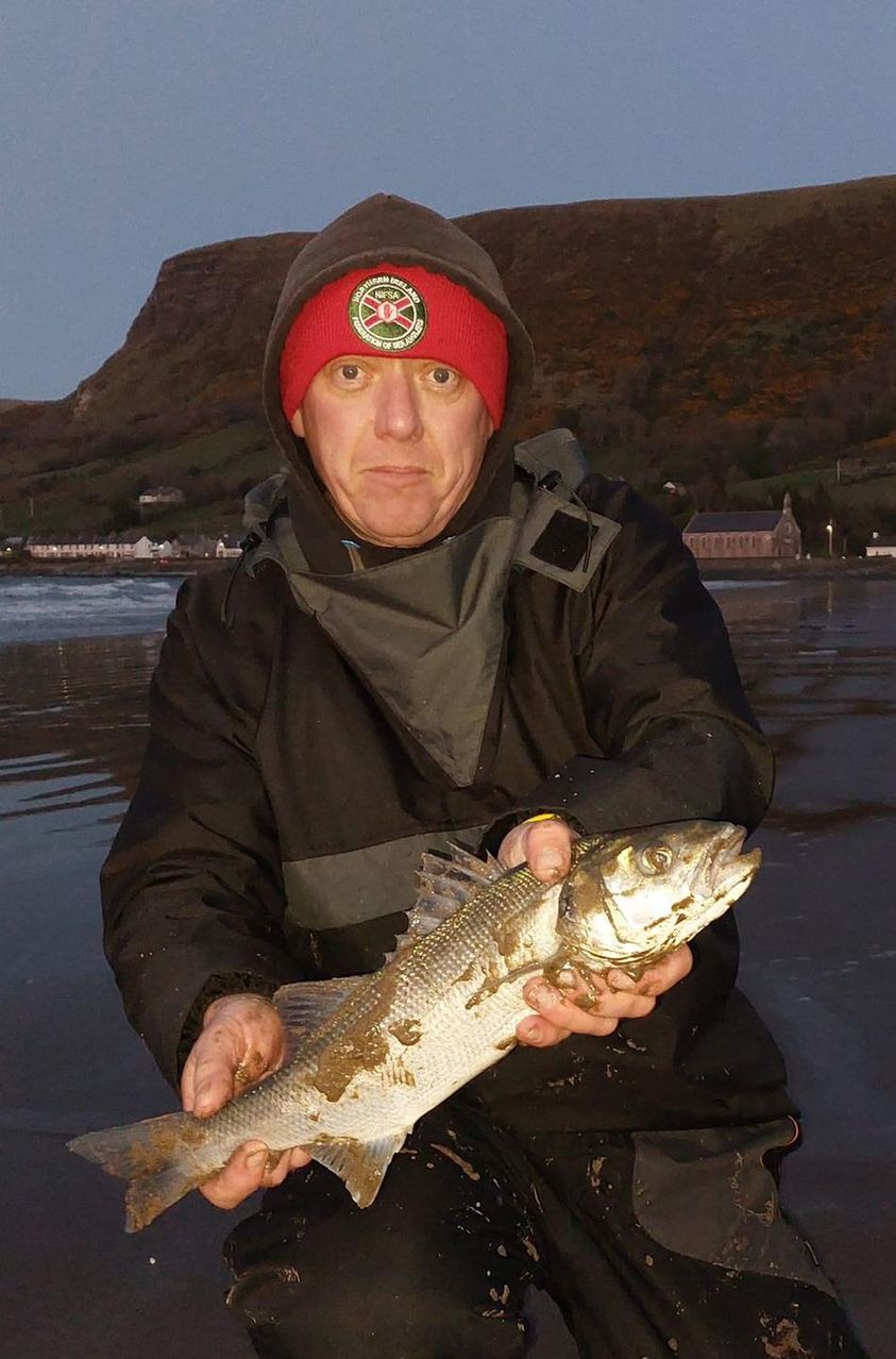 Barry Platt with a Waterfoot fish on a holey of an east wind